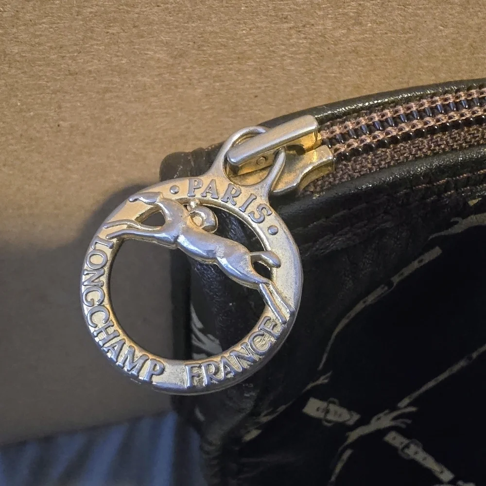 Longchamp Black and Gold Clutch